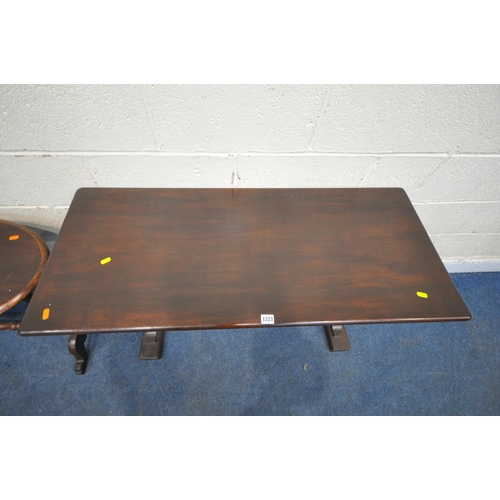 1223 - A LATE 20TH CENTURY RECTANGULAR TABLE, raised on turned legs and shaped feet, united by a stretcher,... 