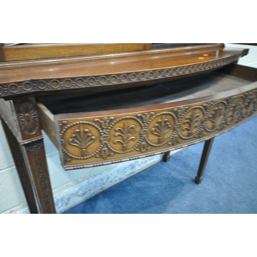 1297 - AN EARLY 20TH CENTURY MAHOGANY BOOKCASE ON STAND, the top with an overhanging cornice, the double as... 