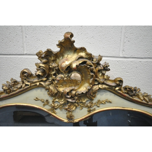 1299 - A 19TH CENTURY LOUIS XV GILT FRAMED OVERMANTLE MIRROR, with a shaped bevelled plate, 113cm x 115cm (... 