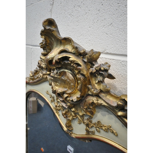 1299 - A 19TH CENTURY LOUIS XV GILT FRAMED OVERMANTLE MIRROR, with a shaped bevelled plate, 113cm x 115cm (... 