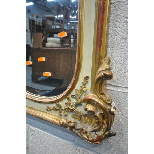 1299 - A 19TH CENTURY LOUIS XV GILT FRAMED OVERMANTLE MIRROR, with a shaped bevelled plate, 113cm x 115cm (... 