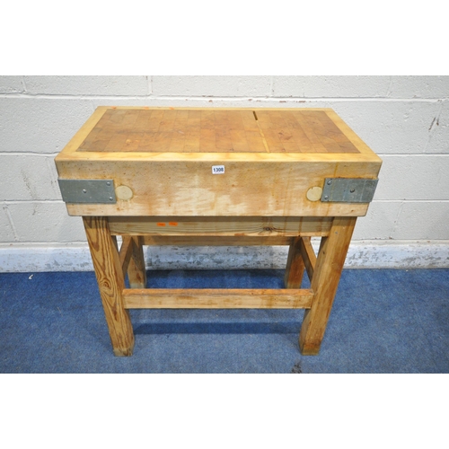 1308 - A BUTCHERS BLOCK, on a separate pine stand, width 84cm x depth 46cm x height 84cm, and a ham clamp (... 