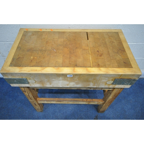 1308 - A BUTCHERS BLOCK, on a separate pine stand, width 84cm x depth 46cm x height 84cm, and a ham clamp (... 