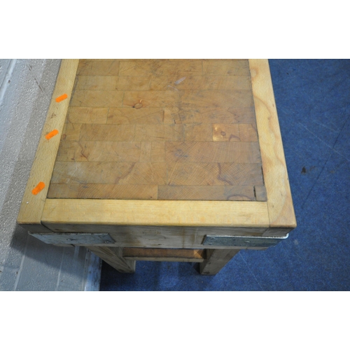 1308 - A BUTCHERS BLOCK, on a separate pine stand, width 84cm x depth 46cm x height 84cm, and a ham clamp (... 