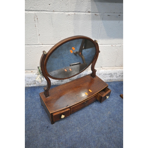 1310 - A GEORGIAN MAHOGANY SWING MIRROR, with three drawers and bone handles, along with another swing mirr... 