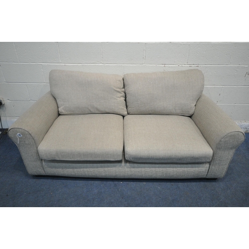 1325 - A CREAM UPHOLSTERED TWO SEATER SETTEE (condition report: appears clean)