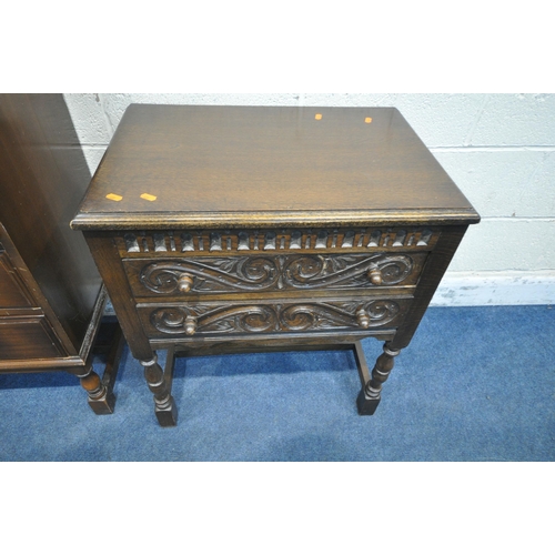 1233 - A LATE 20TH CENTURY OAK BUREAU, the linenfold fall front door enclosing a fitted interior, above thr... 