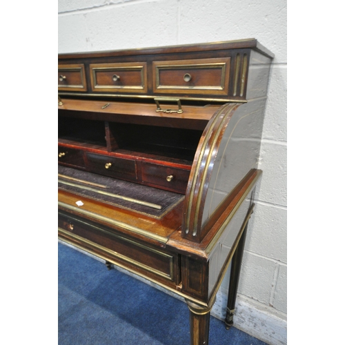 1249 - A LOUIS XVI STYLE MAHOGANY CYLINDER DESK, retailer label to reverse reading Leon Molinghem, with gil... 