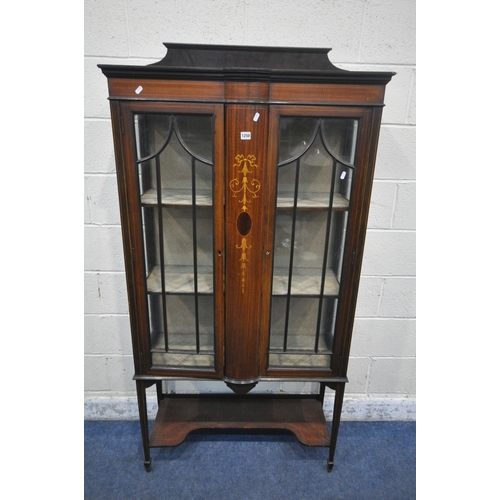 1250 - AN EDWARDIAN MAHOGANY AND INLAID DOUBLE DOOR DISPLAY CABINET, on square tapered legs, spade feet, un... 