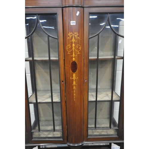 1250 - AN EDWARDIAN MAHOGANY AND INLAID DOUBLE DOOR DISPLAY CABINET, on square tapered legs, spade feet, un... 