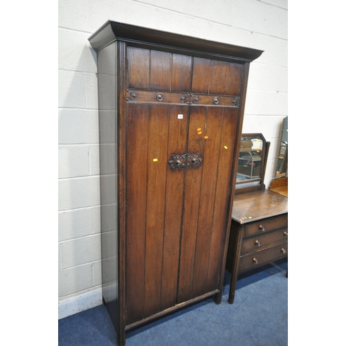 1256 - AN OAK TWO DOOR WARDROBE, width 99cm x depth 58cm x height 194cm, and matching dressing table with a... 