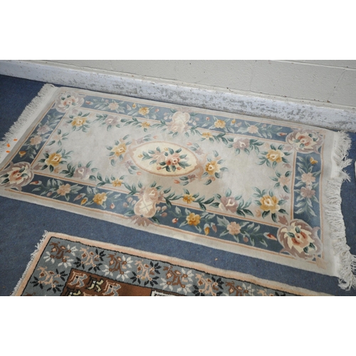 1266 - A CHINESE CREAM WOOLLEN RUG, 192cm x 92cm, and two smaller rugs (condition report: Chinese rug disco... 