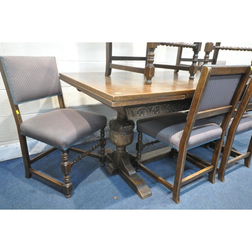 1267 - AN EARLY 20TH CENTURY OAK DRAW LEAF TABLE, on acorn supports, length 183cm x depth 92cm x height 76c... 