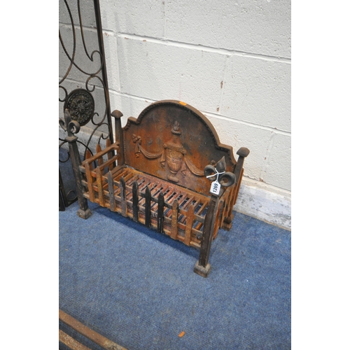 1269 - A CAST IRON GOTHIC FIRE GRATE, width 49cm, along with a folding screen and large cast iron fire grat... 