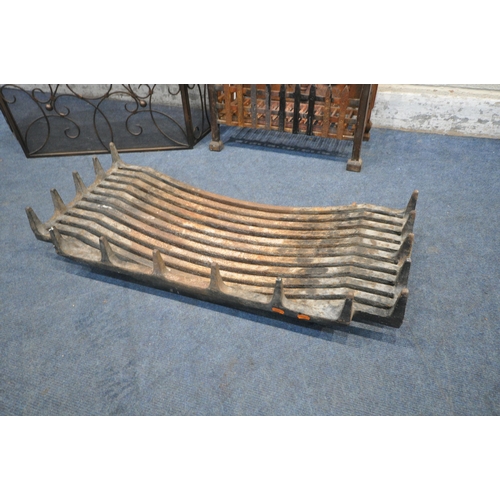 1269 - A CAST IRON GOTHIC FIRE GRATE, width 49cm, along with a folding screen and large cast iron fire grat... 