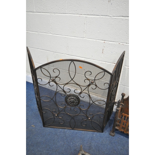 1269 - A CAST IRON GOTHIC FIRE GRATE, width 49cm, along with a folding screen and large cast iron fire grat... 