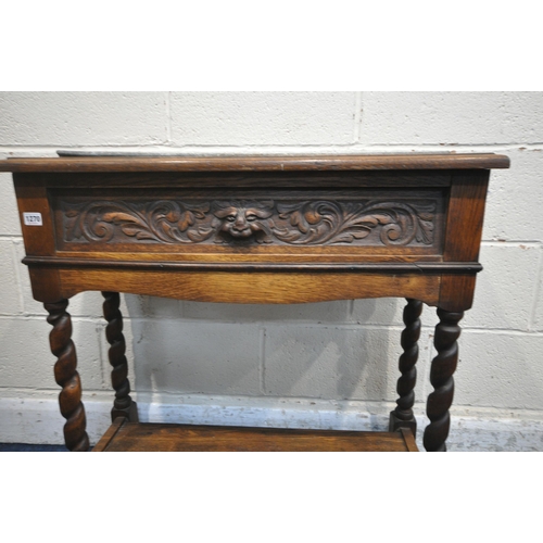 1270 - A 20TH CENTURY CARVED OAK RECTANGULAR PLANTER, with a carved mask panel to the front, galvanised lin... 