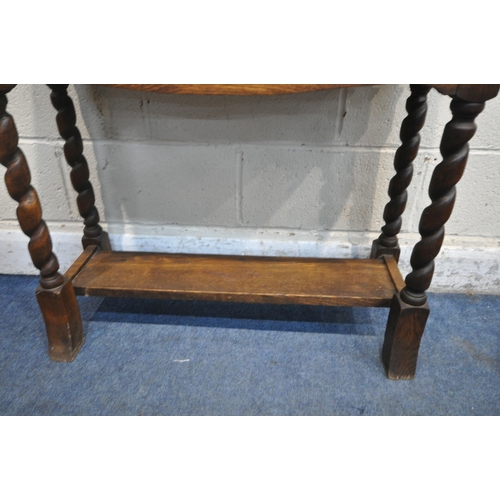 1270 - A 20TH CENTURY CARVED OAK RECTANGULAR PLANTER, with a carved mask panel to the front, galvanised lin... 