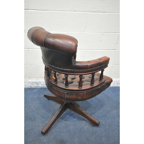 1276 - A BROWN BUTTONED LEATHER SWIVEL OFFICE CHAIR, on casters (condition report: scuffs and scratches to ... 