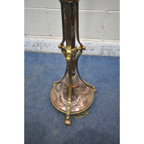 1279 - AN EDWARDIAN BRASS AND COPPER TELESCOPIC CONVERTED STANDARD LAMP, with pressed copper decoration, ma... 