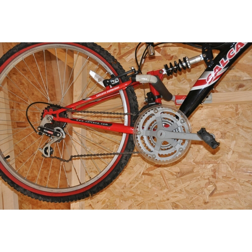 1002 - A SALCANO NOVA MOUNTAIN BIKE with front and rear suspension, 18speed twist grip Shimano gears and 19... 