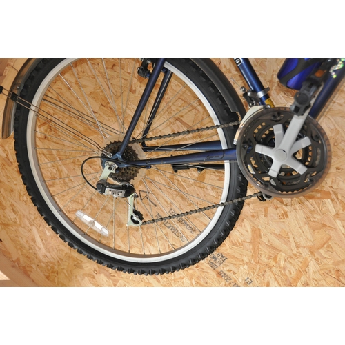 1004 - A PROBIKE NORTH PEAK GENTS MOUNTAIN BIKE  with 18speed twist grip Shimano gears and a sprung seat