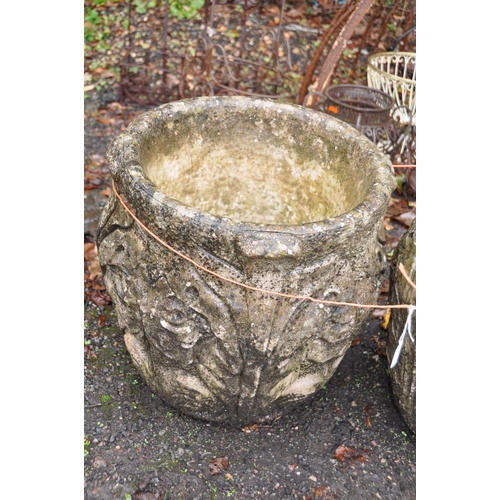 1006 - A PAIR OF MODERN COMPOSITE GARDEN PLANTERS with foliate detail height 44cm