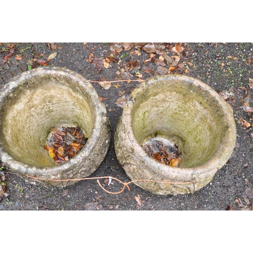 1006 - A PAIR OF MODERN COMPOSITE GARDEN PLANTERS with foliate detail height 44cm