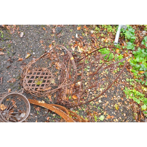 1008 - A COLLECTION OF VINTAGE AND MODERN METAL GARDEN ITEMS including two cast iron hay racks, two wrought... 