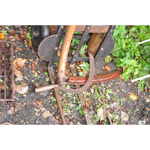 1009 - AN EARLY 20TH CENTURY 'GPO' SACK TRUCK with wooden frame, steel strengthening and foot along with a ... 