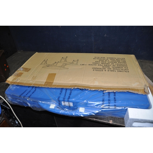 1063 - A BOXED AND UNUSED EARLEX SPRAY  STATION and a folding plastic picnic table and stools (still packag... 