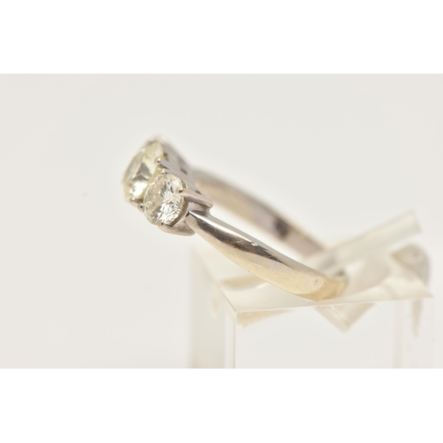 10 - AN 18CT WHITE GOLD THREE STONE DIAMOND RING, designed as three brilliant cut diamonds in claw settin... 