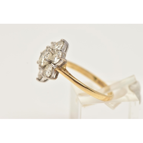 14 - AN 18CT WHITE AND YELLOW GOLD DIAMOND CLUSTER RING, set with a principal round brilliant cut diamond... 