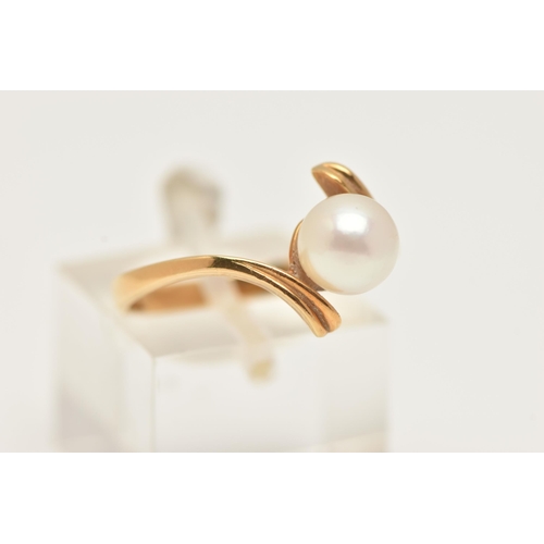 15 - A CULTURED PEARL CROSS OVER RING, designed as a central cultured pearl to the cross over band, stamp... 