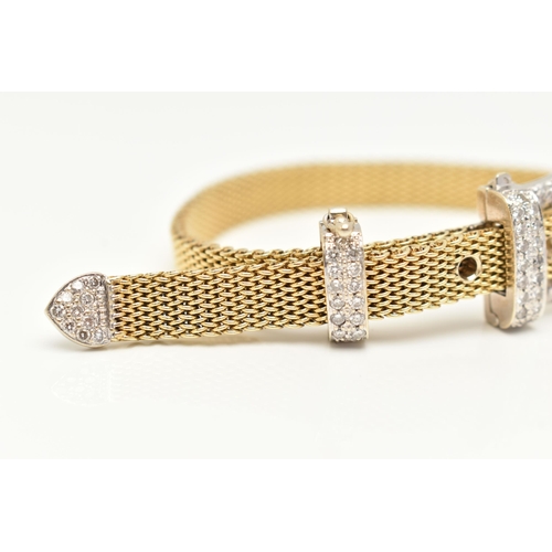 22 - A MODERN WHITE AND YELLOW METAL DIAMOND BUCKLE BRACELET, the front designed as a buckle set througho... 