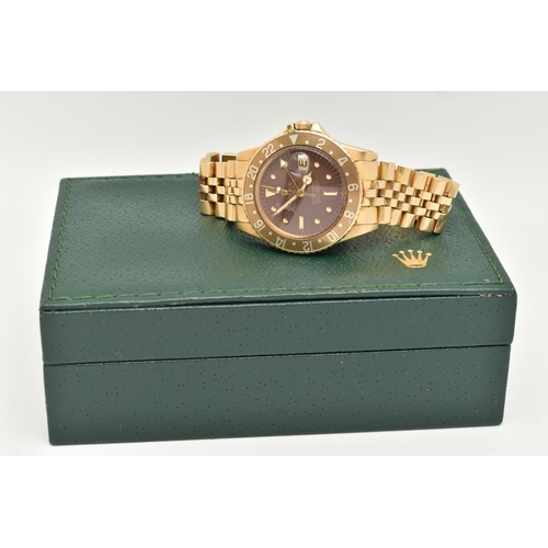 23 - A 1974 YELLOW GOLD ROLEX OYSTER PERPETUAL GMT MASTER WRISTWATCH, model number 1675, believed to be M... 