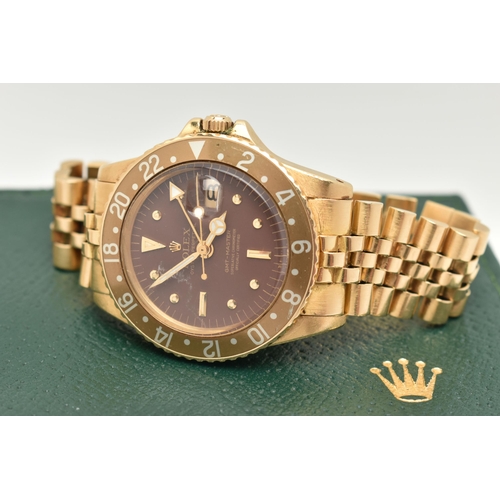 23 - A 1974 YELLOW GOLD ROLEX OYSTER PERPETUAL GMT MASTER WRISTWATCH, model number 1675, believed to be M... 