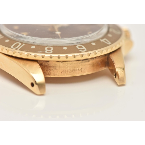 23 - A 1974 YELLOW GOLD ROLEX OYSTER PERPETUAL GMT MASTER WRISTWATCH, model number 1675, believed to be M... 