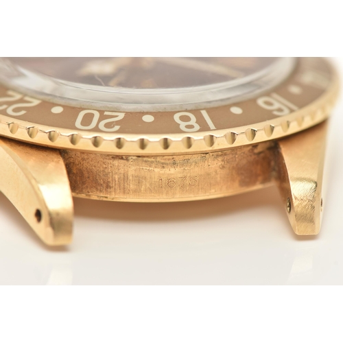 23 - A 1974 YELLOW GOLD ROLEX OYSTER PERPETUAL GMT MASTER WRISTWATCH, model number 1675, believed to be M... 