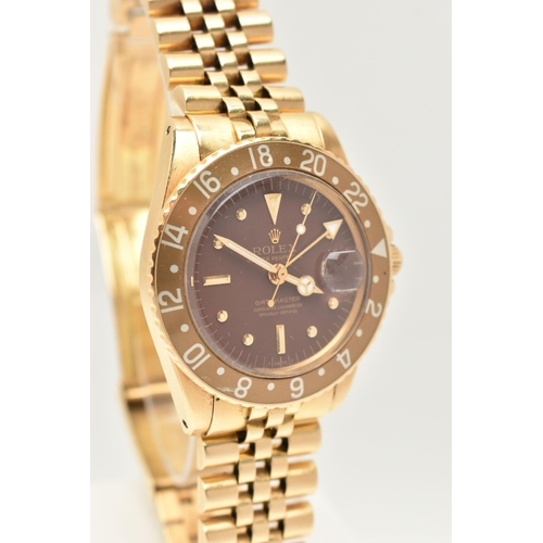 23 - A 1974 YELLOW GOLD ROLEX OYSTER PERPETUAL GMT MASTER WRISTWATCH, model number 1675, believed to be M... 