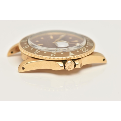 23 - A 1974 YELLOW GOLD ROLEX OYSTER PERPETUAL GMT MASTER WRISTWATCH, model number 1675, believed to be M... 