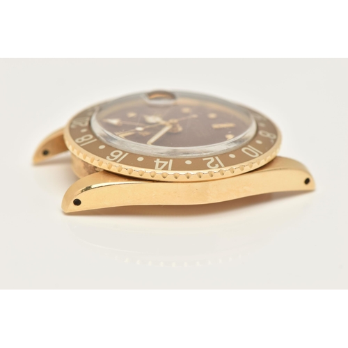 23 - A 1974 YELLOW GOLD ROLEX OYSTER PERPETUAL GMT MASTER WRISTWATCH, model number 1675, believed to be M... 