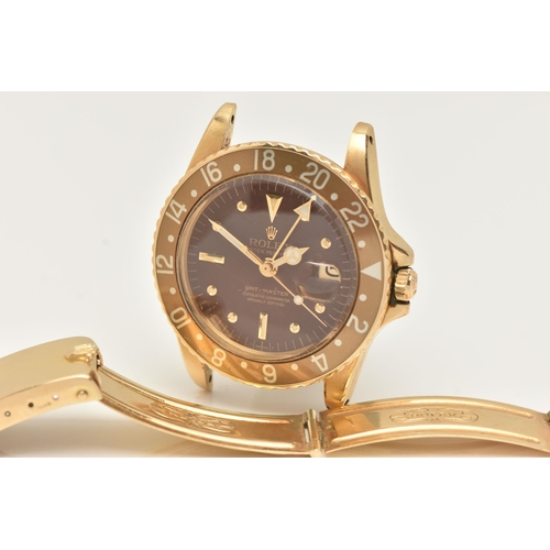 23 - A 1974 YELLOW GOLD ROLEX OYSTER PERPETUAL GMT MASTER WRISTWATCH, model number 1675, believed to be M... 