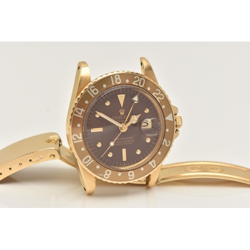 23 - A 1974 YELLOW GOLD ROLEX OYSTER PERPETUAL GMT MASTER WRISTWATCH, model number 1675, believed to be M... 