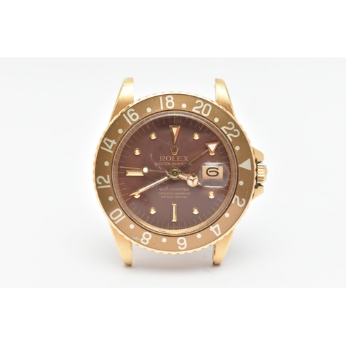 23 - A 1974 YELLOW GOLD ROLEX OYSTER PERPETUAL GMT MASTER WRISTWATCH, model number 1675, believed to be M... 