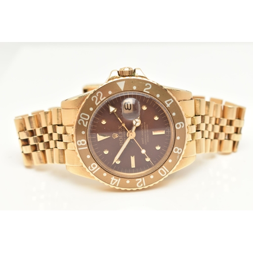 23 - A 1974 YELLOW GOLD ROLEX OYSTER PERPETUAL GMT MASTER WRISTWATCH, model number 1675, believed to be M... 