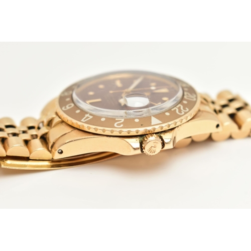 23 - A 1974 YELLOW GOLD ROLEX OYSTER PERPETUAL GMT MASTER WRISTWATCH, model number 1675, believed to be M... 