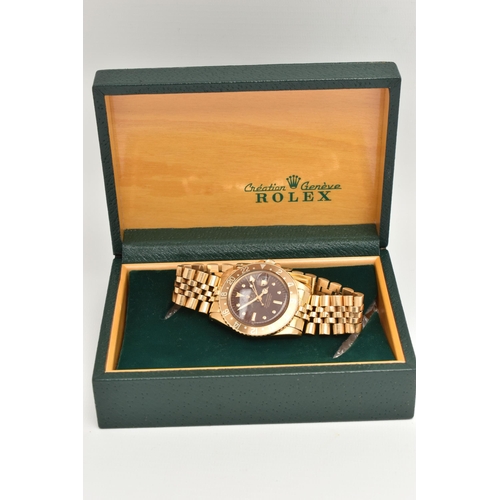 23 - A 1974 YELLOW GOLD ROLEX OYSTER PERPETUAL GMT MASTER WRISTWATCH, model number 1675, believed to be M... 