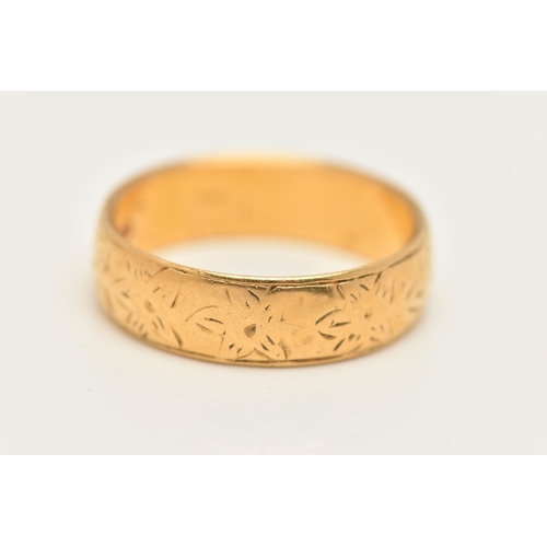 3 - A 22CT GOLD BAND RING, a wide yellow gold band with etched floral detail, approximate width 5.5mm, h... 