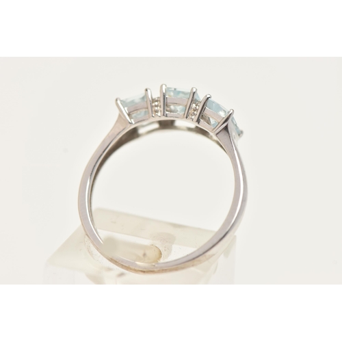 46 - A 9CT WHITE GOLD AQUAMARINE AND DIAMOND RING, set with three rectangular cut aquamarine, each in a f... 